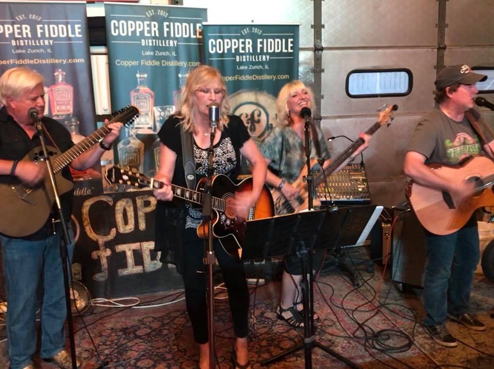 The Secret Acoustic Society at The Copper Fiddle Distillery in Lake Zurich, August 10, 2018.